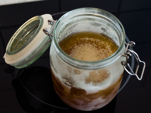 A frozen jar with bourbon and bacon