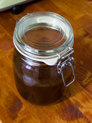 A jar with bourbon and bacon